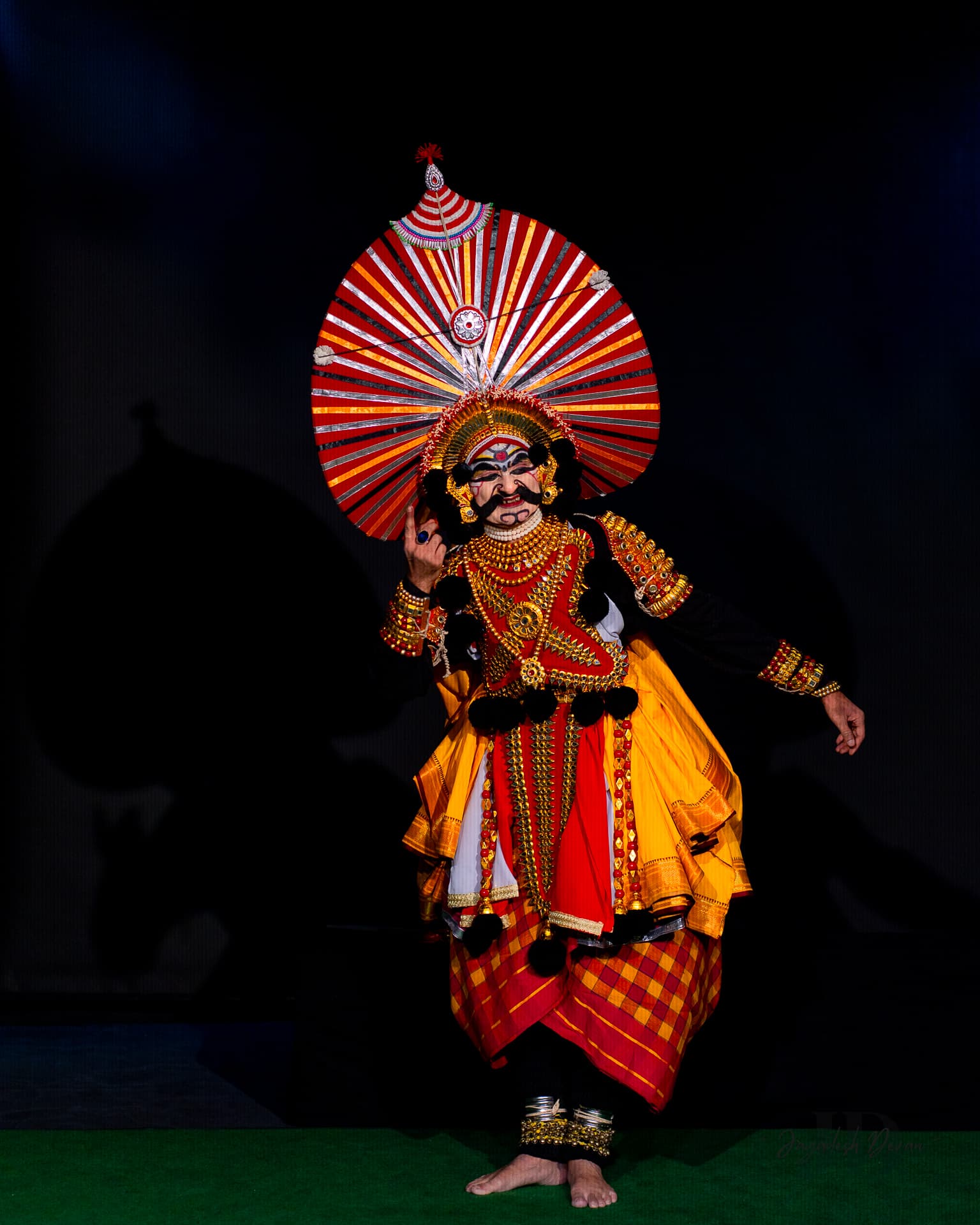 Yakshagana performer in full crown and costume